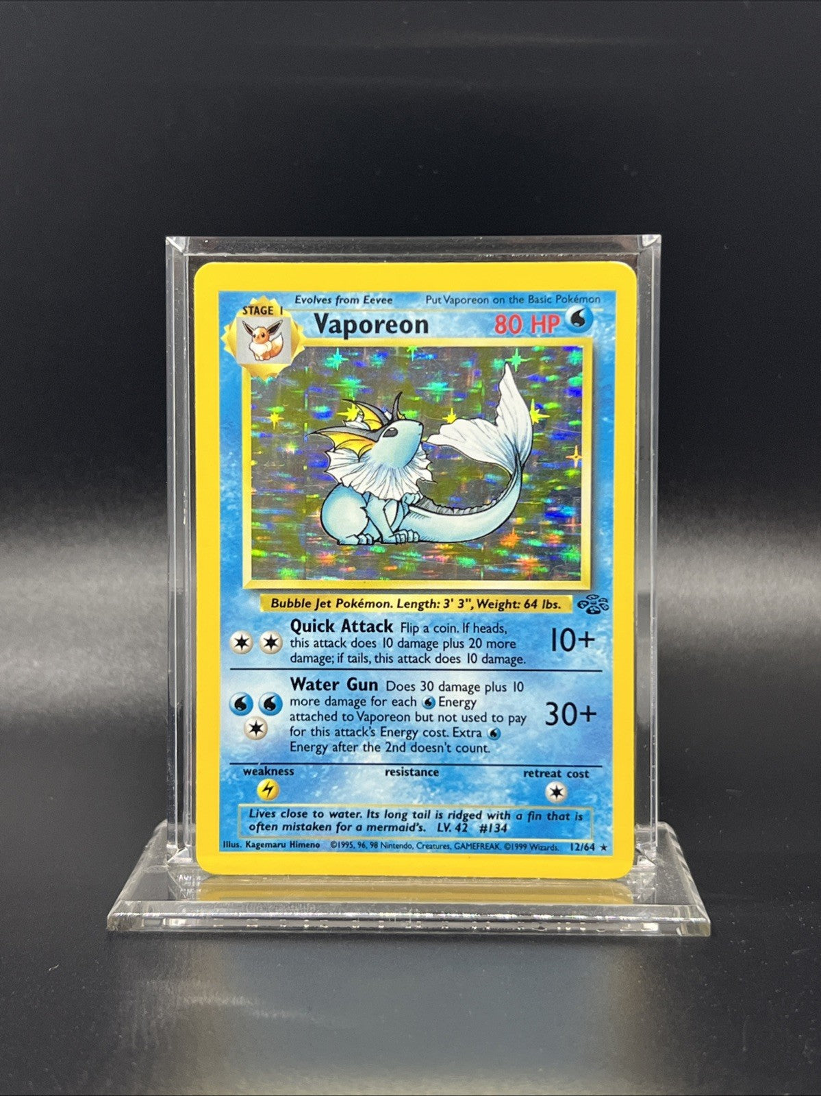 Pokemon Vaporeon 12/64 Jungle Holo - HEAVY PLAY (B)